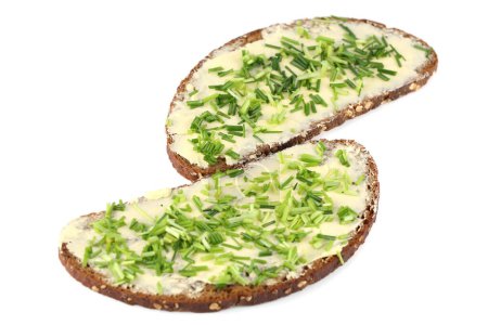 Foto de Dos sándwiches con mantequilla y cebolla verde aislados sobre fondo blanco. - Imagen libre de derechos