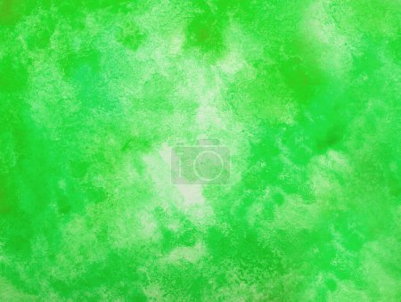 Photo for Abstract green watercolor background. The color splashing on the paper. Hand drawn. - Royalty Free Image