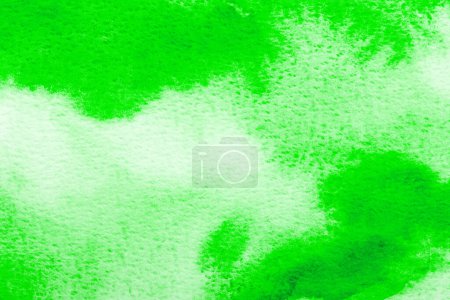 Photo for Abstract green watercolor background. The color splashing on the paper. Hand drawn. - Royalty Free Image