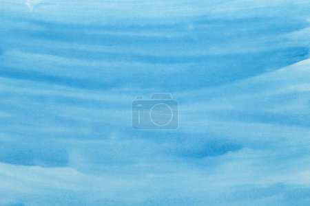 Photo for Abstract blue watercolor background. The color splashing on the paper. Hand drawn. - Royalty Free Image