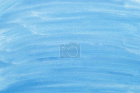 Téléchargez les photos : Abstrait fond bleu aquarelle. Les éclaboussures de couleur sur le papier. Dessiné à la main. - en image libre de droit