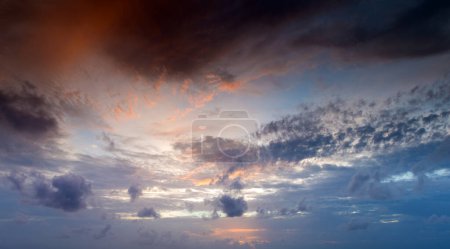 Photo for Sunset with sun rays, sky with clouds and sun. - Royalty Free Image