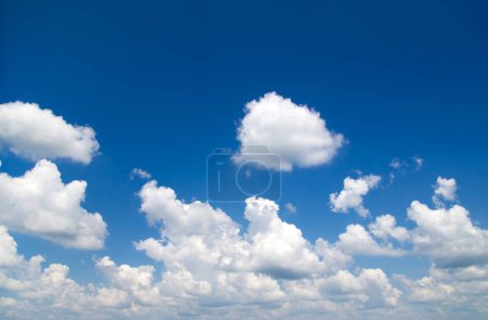 Photo for White fluffy clouds in the blue sky - Royalty Free Image