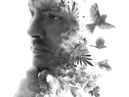 Photo for A black and white conceptual portrait of a man thinking combined with a painting of foliage and flying birds in a paintography technique - Royalty Free Image