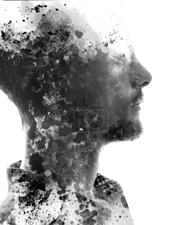 Photo for A concept black and white paintography portrait of a mans profile combined with paint stains on a white background - Royalty Free Image