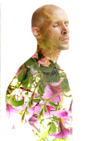 Photo for A half frontal portrait of a man combined with an enlarged photo of pink flowers in double exposure technique - Royalty Free Image
