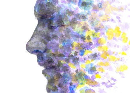 Photo for A black and white profile portrait of a man with closed eyes combined with an abstract colorful paint stain pattern in double exposure technique - Royalty Free Image
