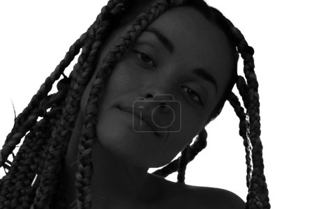 Photo for A closeup low contrast portrait of a young woman with dreadlocks - Royalty Free Image