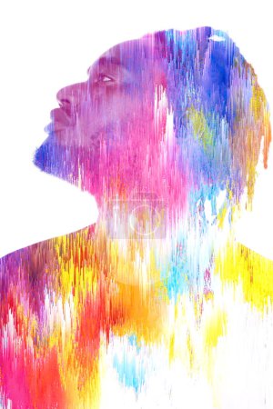 A profile portrait of an african american man looking up combined with a 3D glitch texture in a double exposure