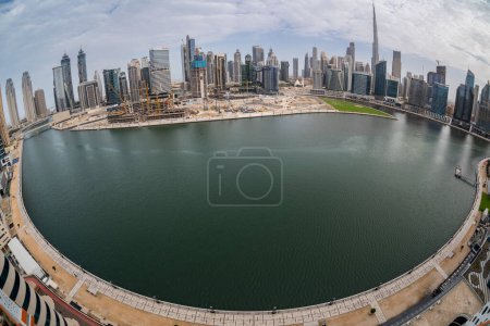 Photo for Dubai, UAE - April 2, 2023: Skyline of construction of downtown district from apartment in Business Bay - Royalty Free Image