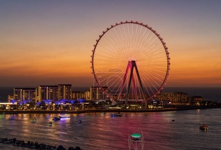 Photo for Lights on structure of Ain Dubai Observation Wheel on BlueWaters Island at sunset - Royalty Free Image