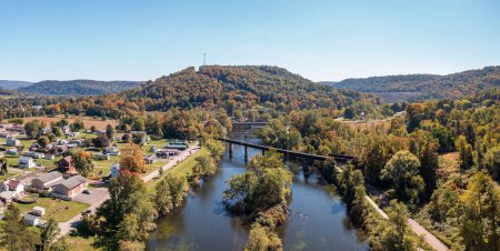 Photo for Aerial panorama of the small town of Confluence in Somerset County in Pennsylvania with fall colors on the leaves and trees - Royalty Free Image
