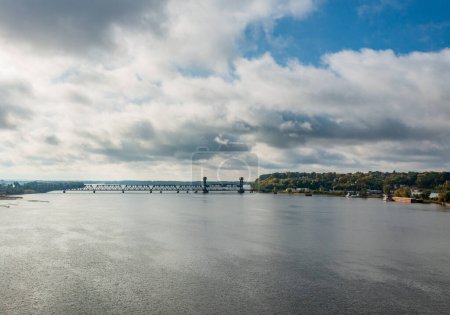 Photo for Modernized Burlington Rail bridge with vertical lift span for Mississippi river barge traffic between Iowa and Illinois - Royalty Free Image