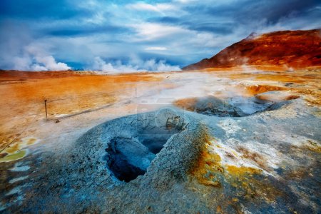 Photo for Ominous view geothermal area Hverir (Hverarond). Popular tourist attraction. Dramatic and picturesque scene. Location place Lake Myvatn, Krafla northeastern region of Iceland, Europe. Beauty world. - Royalty Free Image