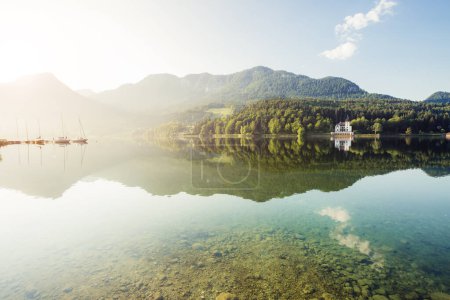 Photo for Fantastic views of the morning lake glowing by sunlight. Dramatic and picturesque scene. Location: resort Grundlsee, Liezen District of Styria, Austria, Alps. Europe. Beauty world. Instagram effect. - Royalty Free Image