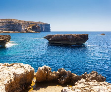 Photo for Fantastic views of rocky coast on a sunny day with blue sky. Picturesque and gorgeous scene. Location famous place Azure Window, Gozo island, Dwejra. Malta. Europe. Mediterranean sea. Beauty world. - Royalty Free Image