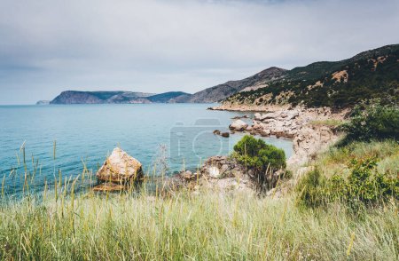 Photo for Blue sea in the morning light. Picturesque and gorgeous scene. Location place Black Sea, Crimea, Ukraine, Europe. Cross process filter, retro and vintage style. Instagram toning effect. Beauty world. - Royalty Free Image