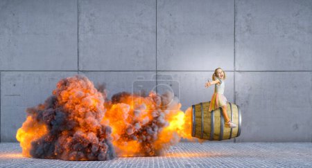 Foto de Feliz niña monta un gran barril de madera con propulsión, llamas y humo por detrás - Imagen libre de derechos