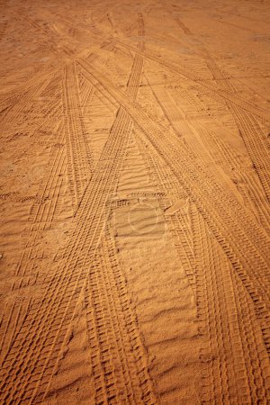Photo for Wheel tracks on desert sand - Royalty Free Image
