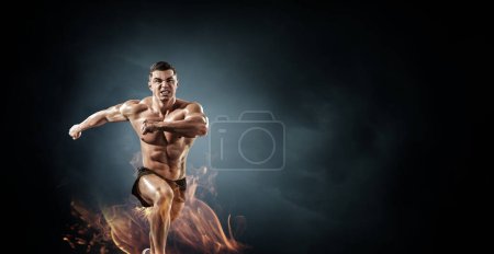 Photo for Male runner against dark background. Mixed media - Royalty Free Image