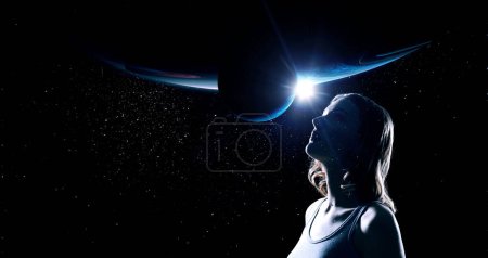 Photo for The universe within. Silhouette of a woman inside the universe. The concept on scientific and philosophical topics. Elements of this image furnished by NASA. - Royalty Free Image