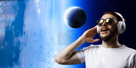 Photo for Young man with headphones. Mixed media - Royalty Free Image