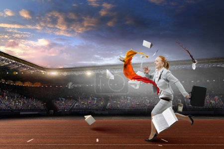 Photo for Competition in business concept with running businesswoman. Mixed media - Royalty Free Image