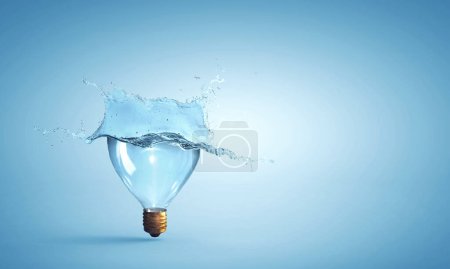 Photo for Light bulb from water splash. Mixed media - Royalty Free Image