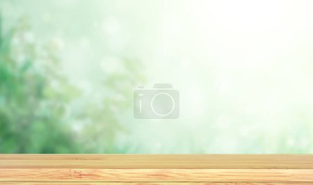 Téléchargez les photos : Old wooden table and abstract green background. Empty wooden table top on blurred backdrop. Rustic wooden board on nature background. Product display template. Copy space for text - en image libre de droit