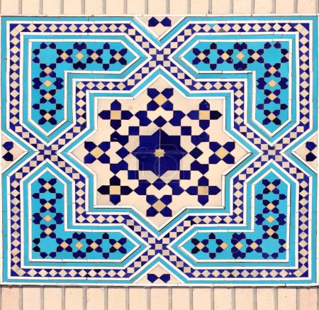 Photo for Detail of traditional persian mosaic wall with geometric ornament of blue, dark blue and yellow color, Iran - Royalty Free Image