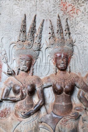 Photo for Wall carving -  apsara dancers, famous Angkor Wat complex, khmer culture, Siem Reap, Cambodia. UNESCO world heritage site - Royalty Free Image