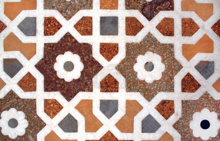 Photo for Mosaic of amber, cornelian, jasper, lapis lazuli, onyx, topaz and marble. Ancient decorative ornament wall of the famous Itimad-ud-Daula mausoleum, Agra, Uttar Pradesh, India - Royalty Free Image