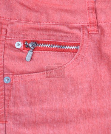Photo for Jeans pocket of pink color. Vertical background with denim texture of coral color and pocket - Royalty Free Image