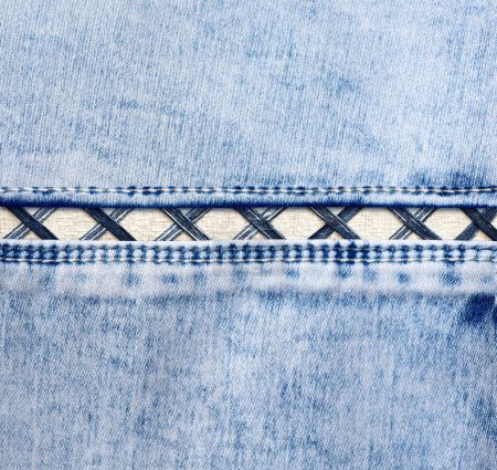 Photo for Blue denim background with a seam. Light blue color denim jeans fabric texture. Copy space for text - Royalty Free Image