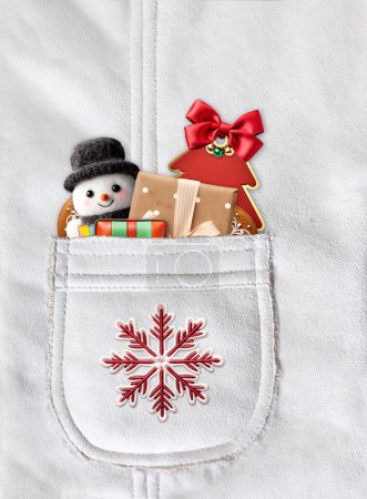 Photo for Vertical Christmas backdrop with gifts in pocket on suede texture of ivory color. Xmas background with toys and gift box in suede pocket of light beige color. Copy space for text - Royalty Free Image