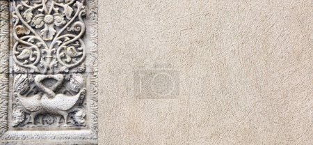 Photo for Horizontal background with stone bas-relief with two kissing swans and floral ornament. Backdrop with sandstone carving decor. Mock up template. Copy space for text - Royalty Free Image