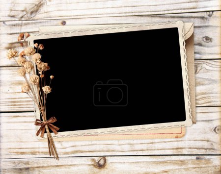 Photo for Old photo, dry leaf and flowers, vintage paper card and retro envelope on wooden board. Nostalgic square scrapbooking background. Mock up template. Copy space for text - Royalty Free Image