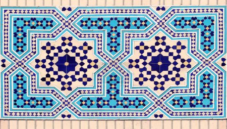 Foto de Detail of traditional persian mosaic wall with geometric ornament of blue, dark blue and yellow color, Iran - Imagen libre de derechos