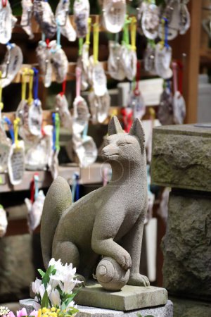 Photo for Ancient stone statue of fox, Kakigara inari (Inari-sha) Hasedera temple (Hase-kannon temple), Kamakura, Japan - Royalty Free Image