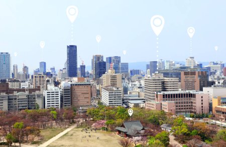Photo for Network connection concept. Aerial view on Osaka with white location pin. Global positioning system pin map. Map pins with Osaka city, Japan. Modern travel, sightseeing and tourism concept - Royalty Free Image