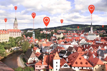 Network connection concept. Aerial view on old city Cesky Krumlov, Czech Republic, Europe with location pin. Global positioning system pin map. Modern travel, sightseeing and tourism concept
