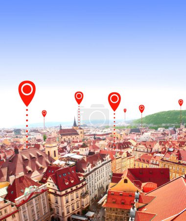 Network connection concept. Aerial view on medieval houses on Old Town Square, Prague and red location pins. Global positioning system pin map. Map pins with Prague, Czech Republic