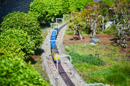 Photo for THE HAGUE, THE NETHERLANDS - APRIL 26, 2022: Mini models of trains at Madurodam miniature park, The Hague, the Netherlands, Holland - Royalty Free Image