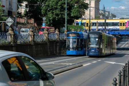 Photo for POLAND, KRAKOW - August 8: Krakow is one of the oldest cities in Poland. View of the street with two trams on August 8, 2023, Krakow, Poland. - Royalty Free Image
