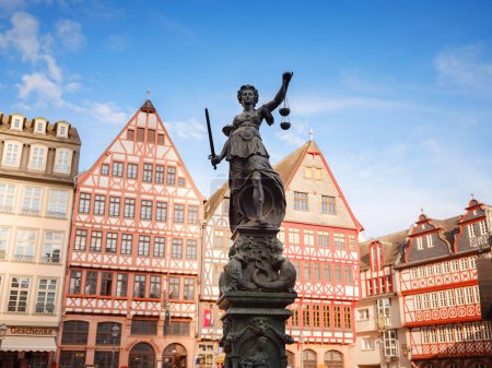 Photo for Frankfurt am Main, Germany - May 5, 2023: Beautiful iconic Romerberg square and Justitia Lady Justice statue with medieval historical buildings background, Frankfurt old town square - Royalty Free Image