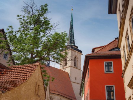 spring trip to Europe. Travel and German sightseeing locations. interesting ancient towers and facades of medieval houses somewhere in Erfurt city