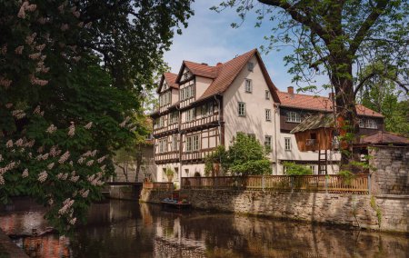 spring trip to Europe. Travel and German sightseeing locations. scenic view to facade of old historic houses somewhere in Erfurt city, Traditional half-timbered houses makes cozy and fairy tail mood