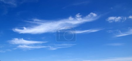 Photo for White fluffy clouds in the blue sky. - Royalty Free Image