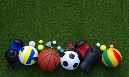 Photo for Set of sport equipment on green grass - Royalty Free Image