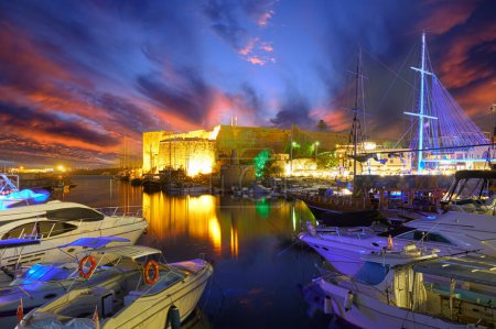 Photo for Kyrenia Harbour in Northern Cyprus in the late evening against the backdrop of the sunset sky - Royalty Free Image